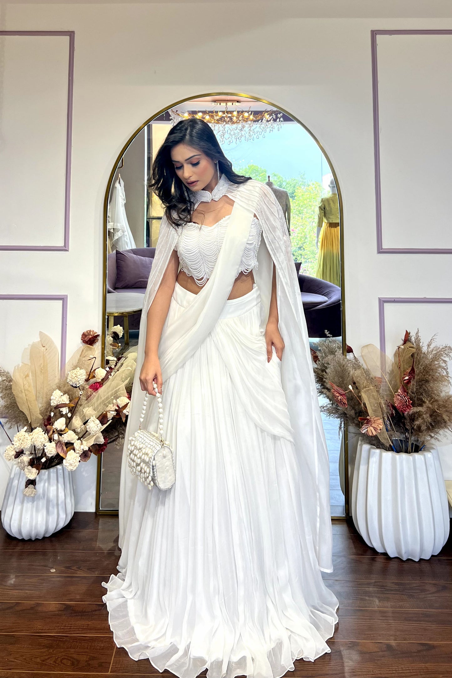 White Drape Lehenga with pearl Cape & Blouse