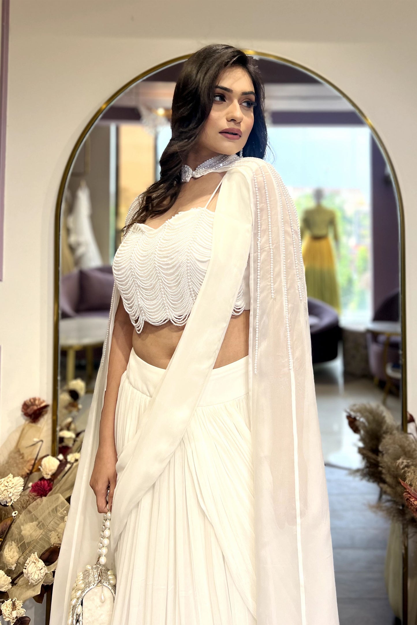 White Drape Lehenga with pearl Cape & Blouse